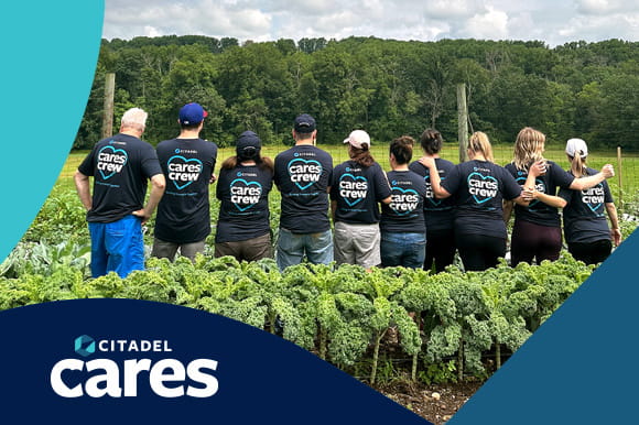 Citadel employees working wearing CARES T shirts