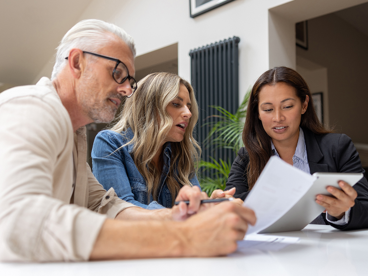 A couple meeting with a mortgage advisor