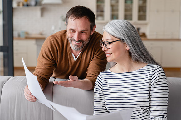 A couple looking at paperwork together