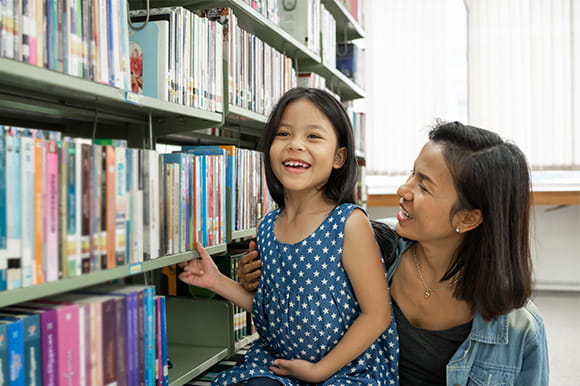 A mother and child at a library